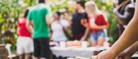 kebabs on grill; Group of people at cookout bbq /barbeque party at home, cooking grilled meat beef veg for bbq, happy friends party lifestyle